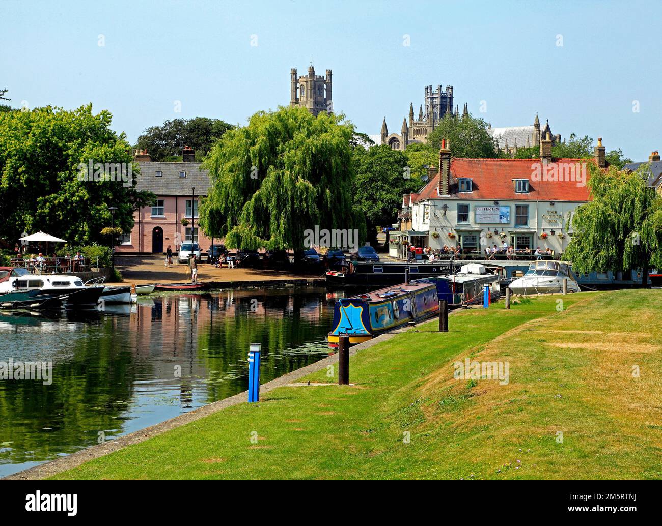 Ely Cathedral, River Ouse and Cutter Inn, Ely, Cambridgeshire, England, UK Stock Photo