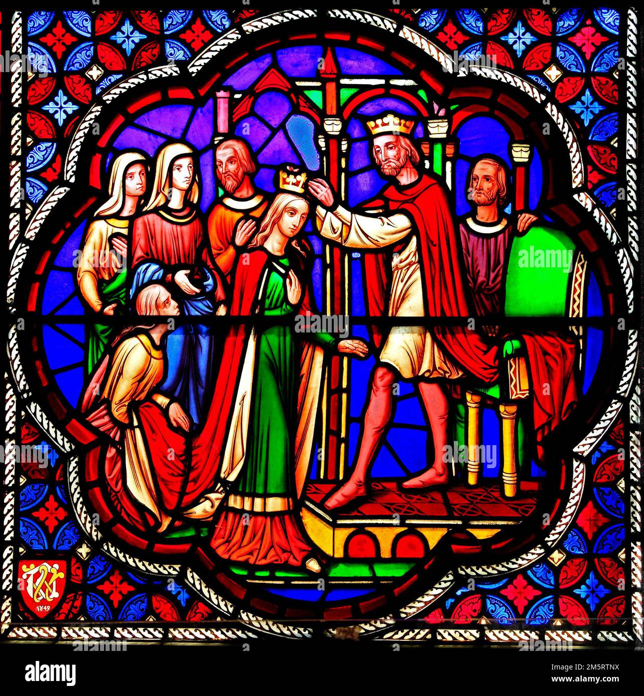 Ely Cathedral, 19th century stained glass window by Wiliam Wailes, 1849, The Crowning of Esther Stock Photo