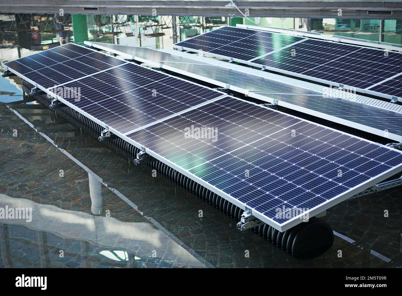 Floating frame module for photovoltaic system floating on water. Rimini, Italy - November 2022 Stock Photo
