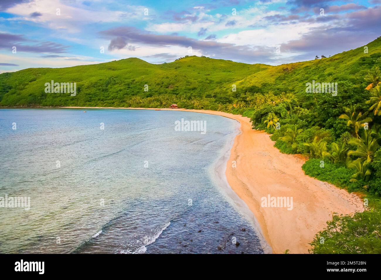 Tropical sandy beach at summer day in Fiji Islands, Pacific ocean Stock Photo