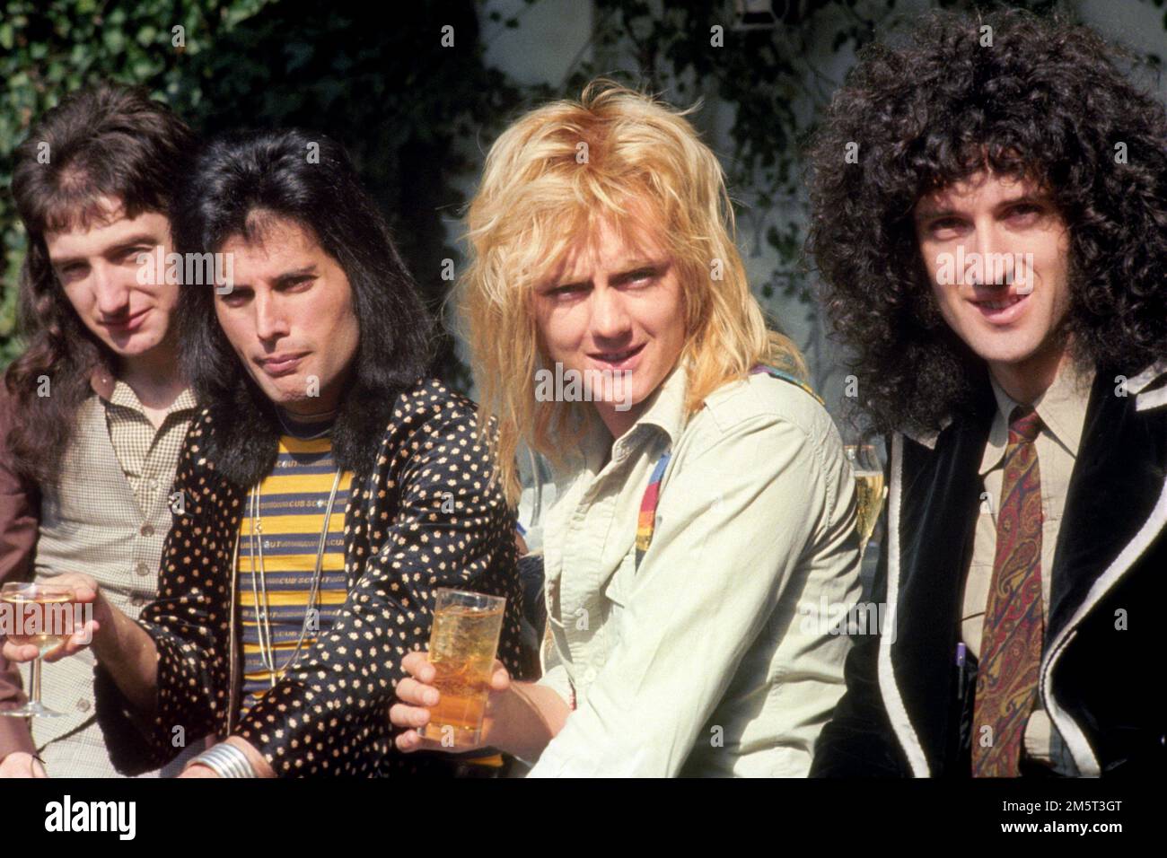 File photo dated 08/09/76 of Rock band 'Queen' (l-r) John Deacon, Freddie Mercury, Roger Taylor and Brian May. Musician, astrophysicist and animal welfare advocate Brian May of Queen has received a Knighthood for services to Music and to Charity in the New Year Honours list. Issue date: Friday December 30, 2022. Stock Photo