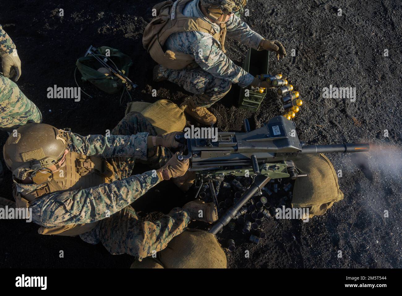 U.S. Marines with 1st Battalion, 2d Marines fire a Mark 19 40 mm grenade machine gun during Fuji Viper 23.1 at Combined Arms Training Center, Camp Fuji, Japan, Dec. 6, 2022. Exercise Fuji Viper exemplifies a commitment to realistic training that produces lethal, ready, and adaptable forces capable of decentralized operations across a wide range of missions. 1/2 is forward deployed in the Indo-Pacific under 4th Marines, 3d Marine Division as part of the Unit Deployment Program. (U.S. Marine Corps photo by Lance Cpl. Jaylen Davis) Stock Photo