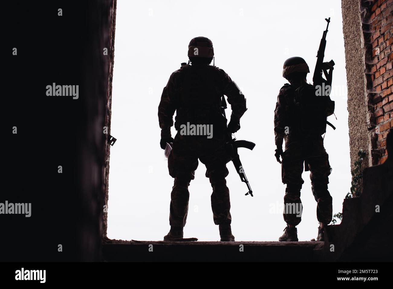 Silhouette photos of the Ukrainian military. Brothers in arms, a man