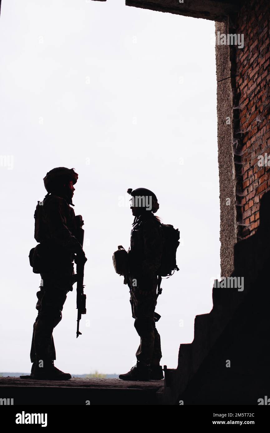 Silhouette photos of the Ukrainian military. Brothers in arms, a man