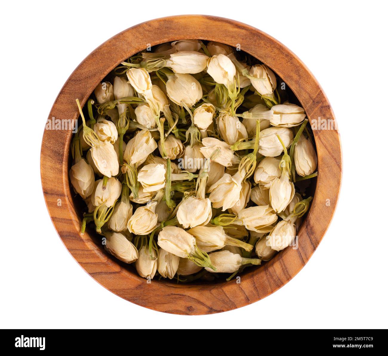 Dry jasmine flowers in wooden bowl, isolated on white background