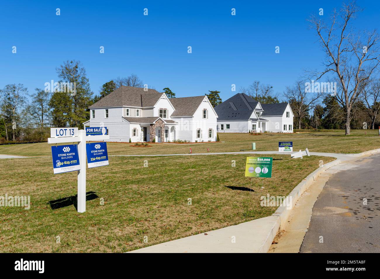 Unoccupied unsold new homes for sale indicating a housing slowdown slump or housing crunch or possibly a housing recession in Montgomery Alabama, USA. Stock Photo
