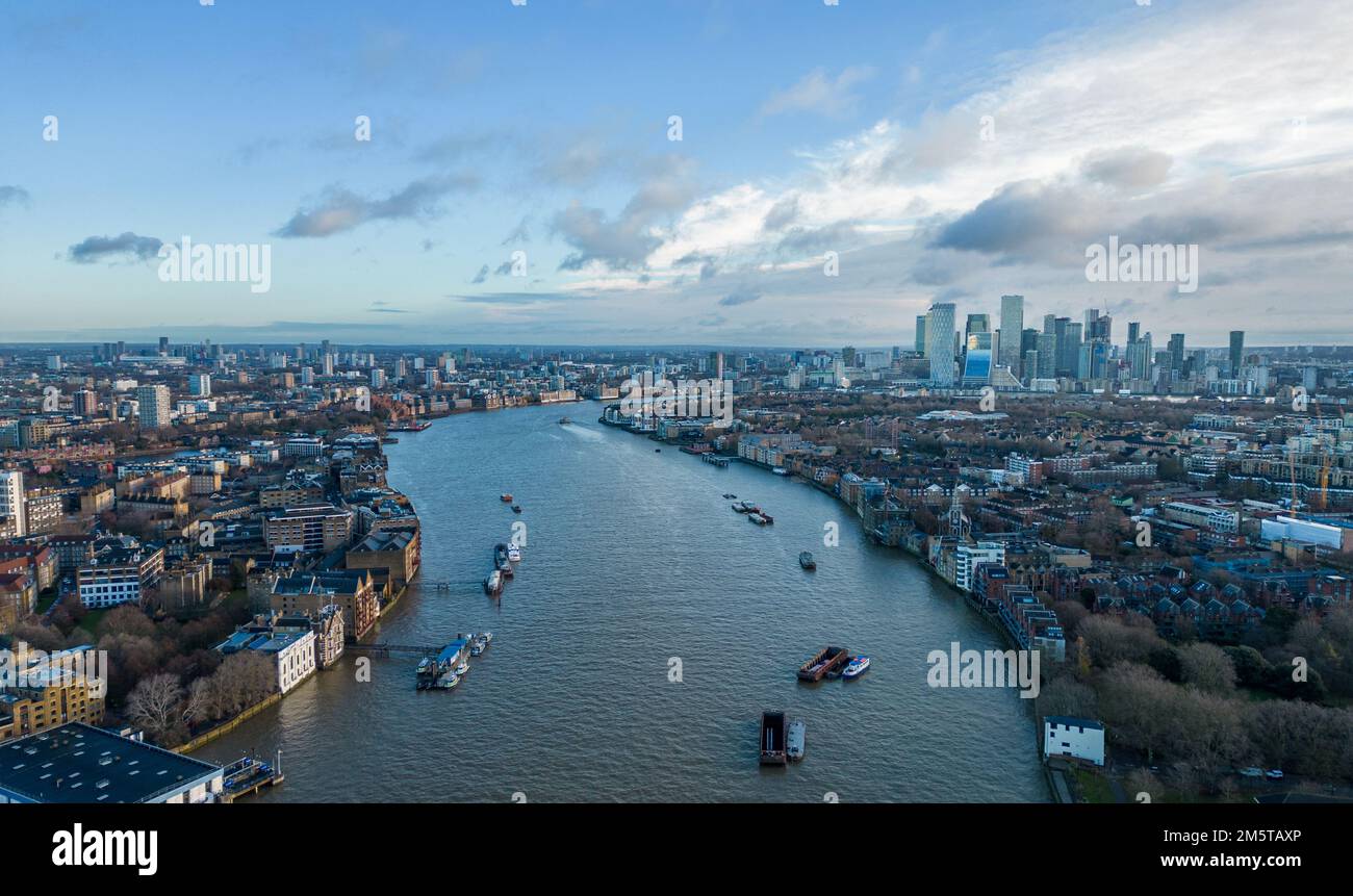 Aerial view over River Thames and Canary Wharf in London - LONDON, UK ...
