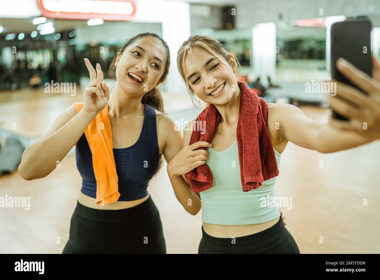 Beautiful fit women taking selfie hi-res stock photography and images ...