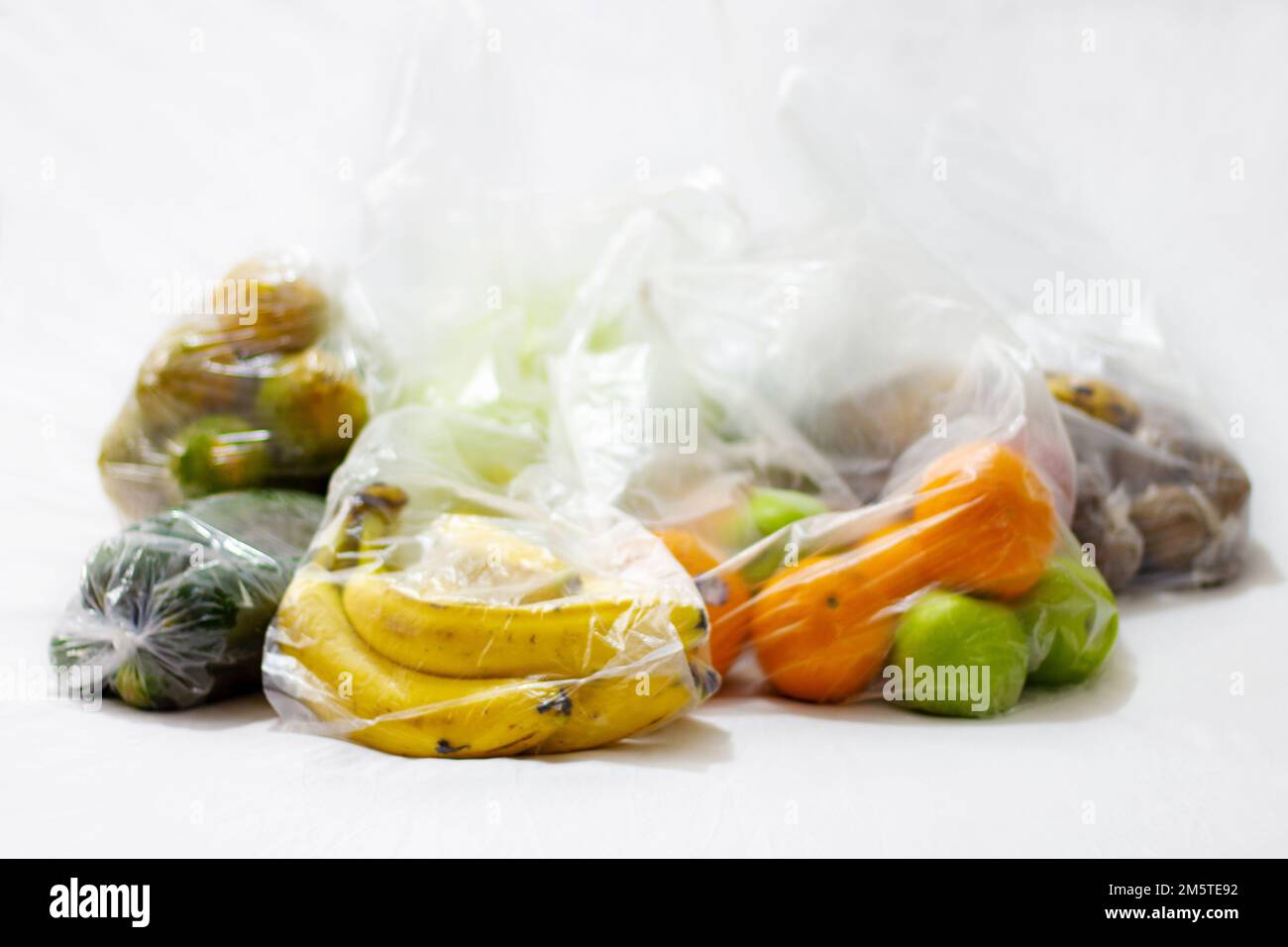 group of javas filled with fruits, white background Stock Photo