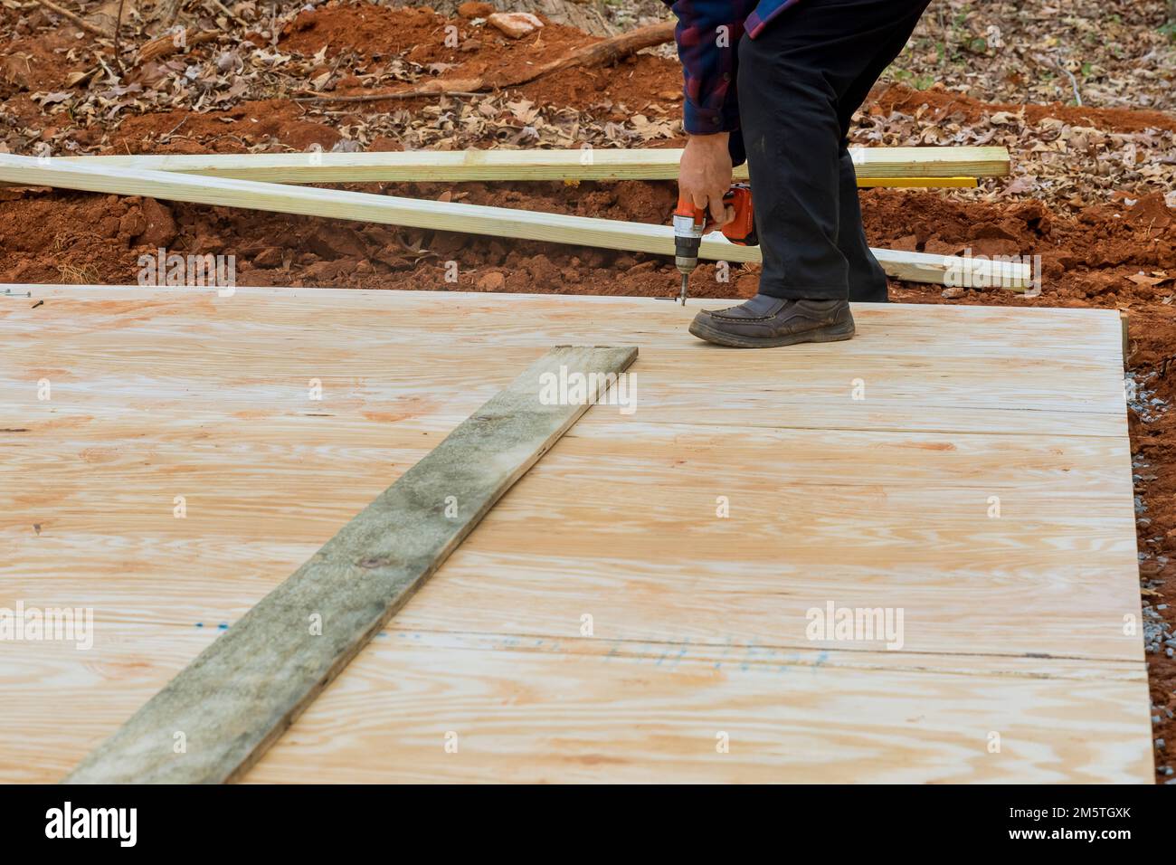 Building shed deck foundation using wood framing beams stick framework is an excellent idea Stock Photo
