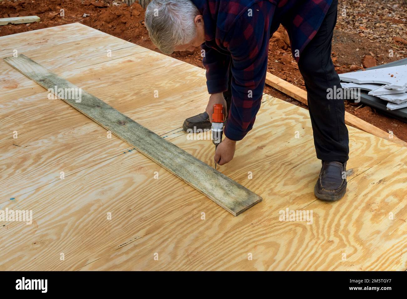 Foundation of the shed deck is built from wood framing beams stick framework Stock Photo