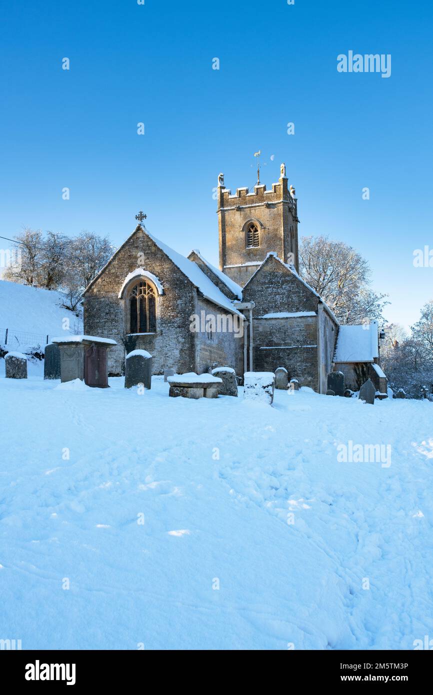 St Oswald's church in the early morning winter snow. Compton Abdale