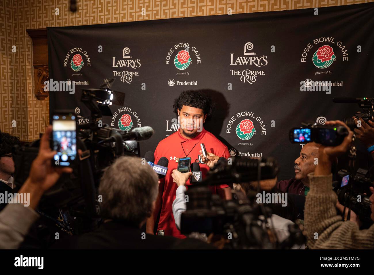 Utah Utes offensive lineman Falcon Kaumatule answers questions from the