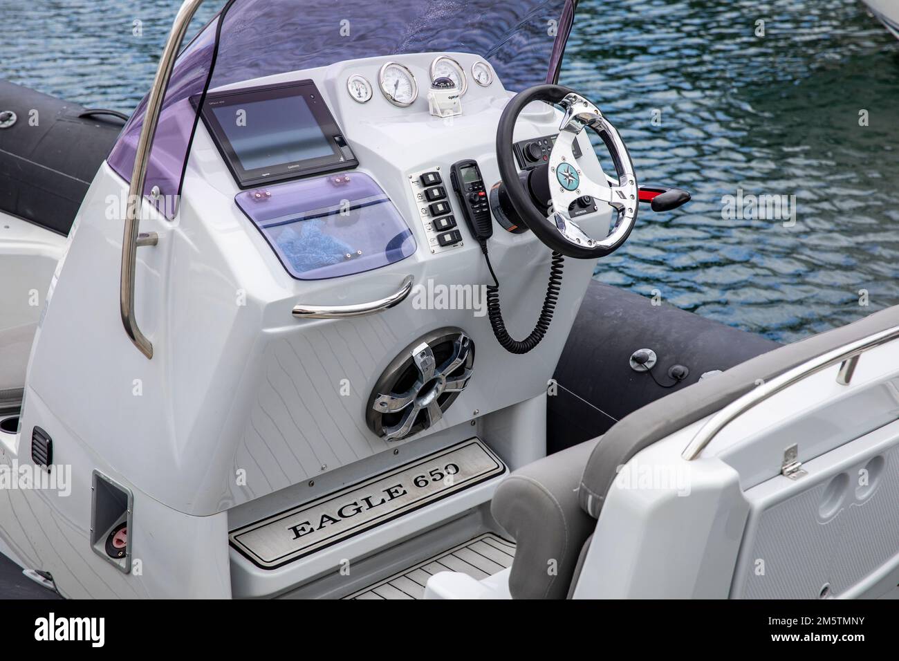 BRIG 650 eagle vessel RIB and close up of boat wheel and boat electronic controls,NSW,Australia Stock Photo