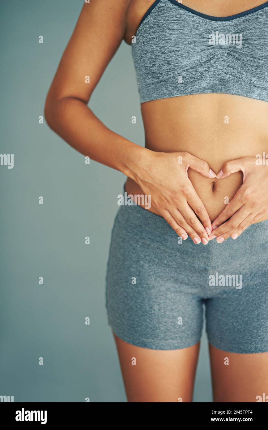 You Earn Your Body. Cropped Shot of a Woman with a Toned Stomach