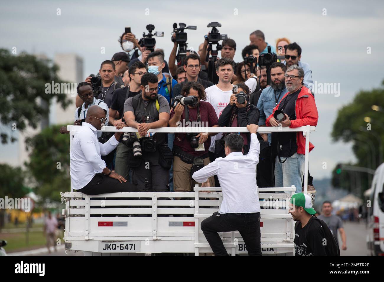 30 December 2022, Brazil, Brasilia: Photographers and other journalists at a rehearsal for the official ceremony two days before Lula da Silva takes office as Brazil's new president on the esplanade of the ministries. Photo: Santiago Mazzarovich/dpa Stock Photo