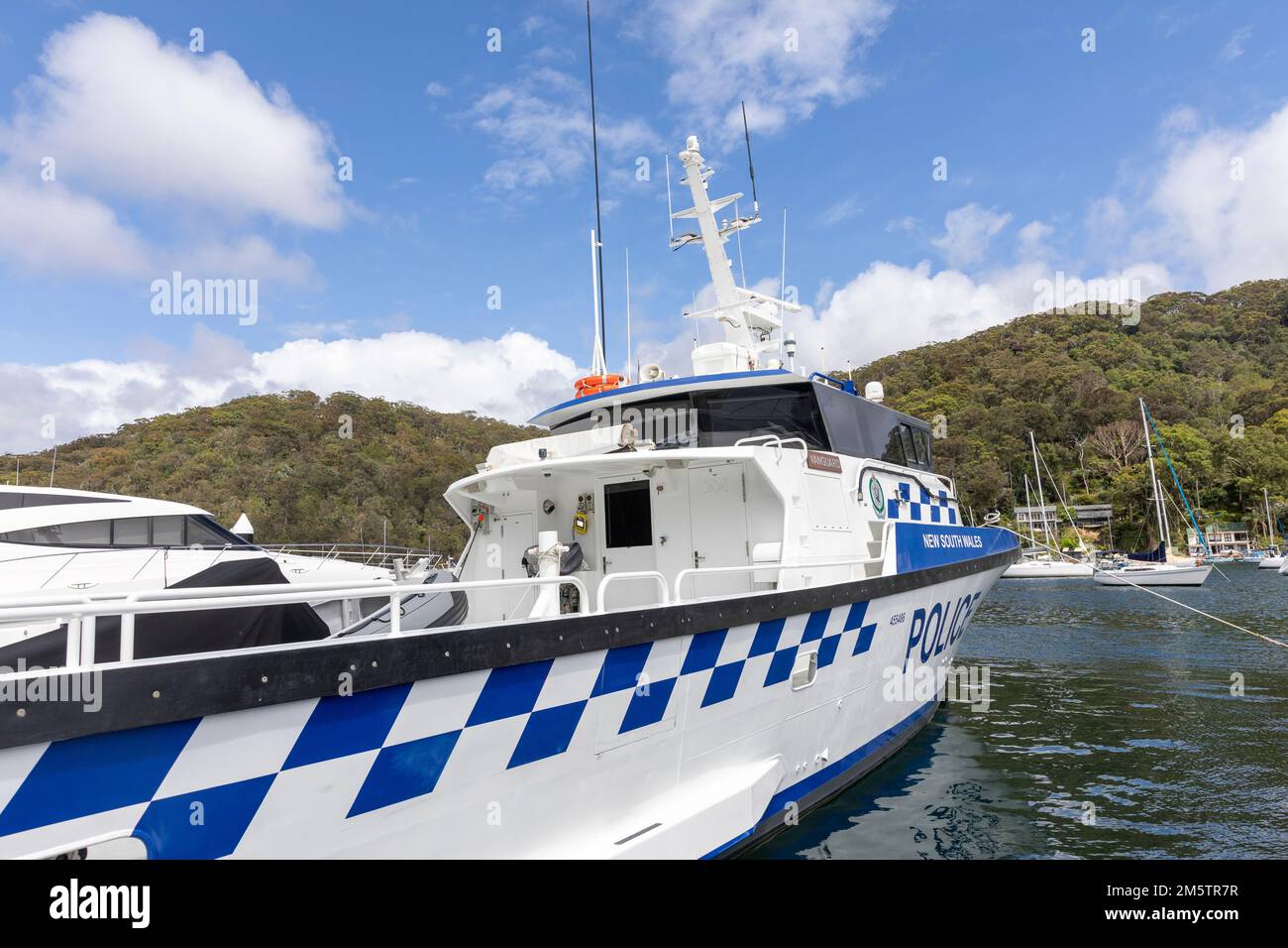 New South Wales police patrol boat the WP22 Vanguard moored on Pittwater at a marina in Church Point,Sydney,NSW,Australia Stock Photo