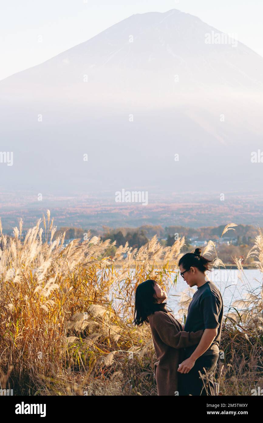 A young couple at Lake Kawaguchi Stock Photo