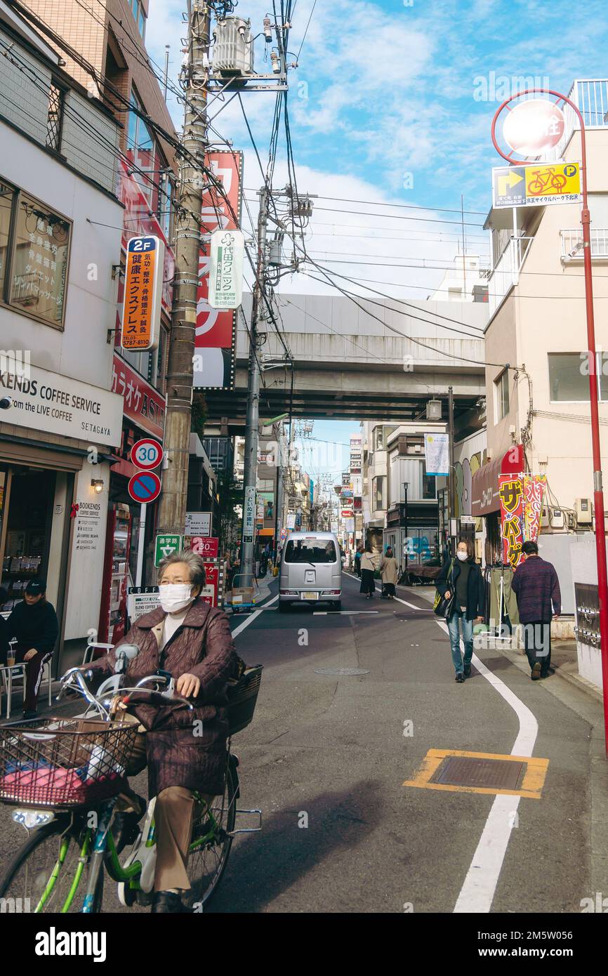 People walking along the streets of Shimokitazawa Stock Photo