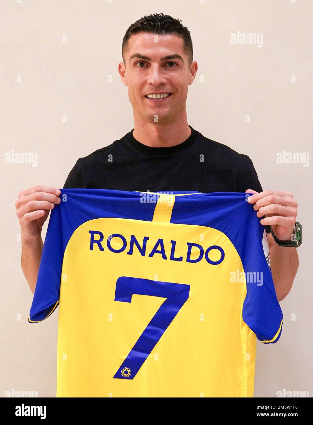 Riyadh Saudi Arabia. 30th Dec 2022. Portuguese football star Cristiano Ronaldo poses with his New Jersey from AlNassr Football Club as he signs to play in the Saudi club in Riyadh Kingdom