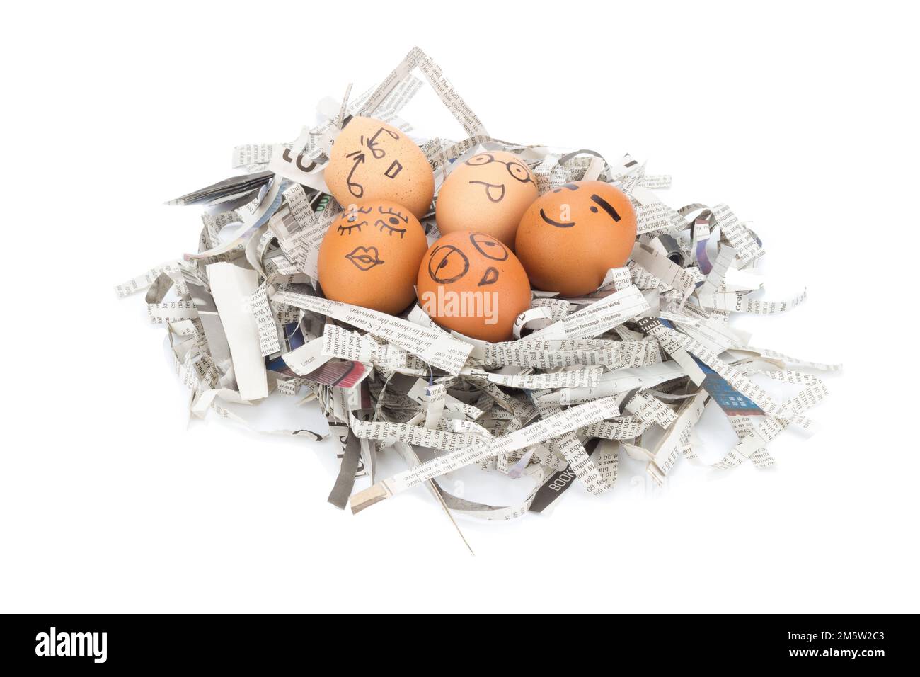 egg face on newspapers recycle Stock Photo Alamy