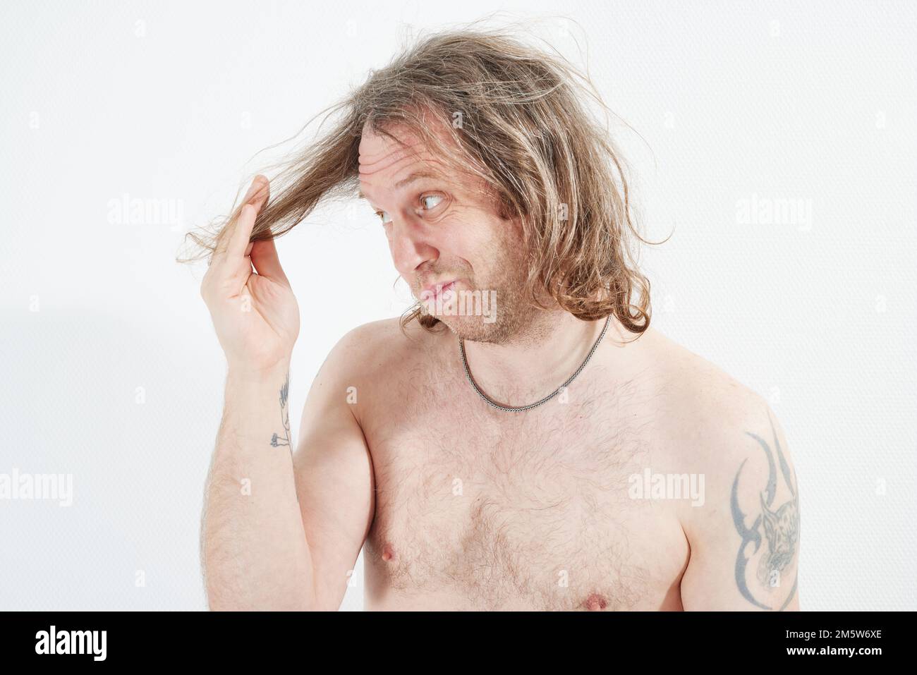Long hair man hi-res stock photography and images - Alamy