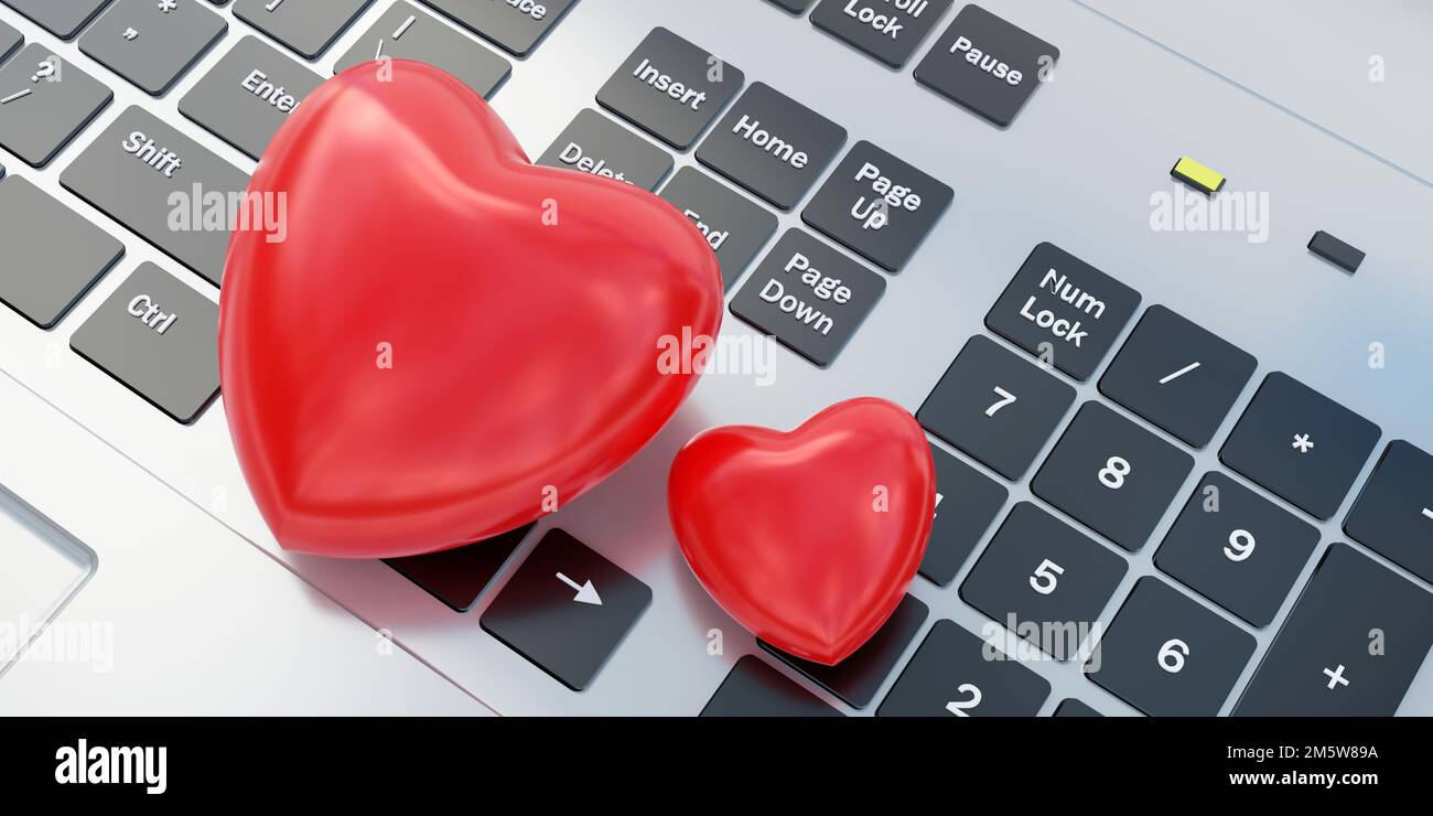 Heart shape passion red color on laptop keyboard background. Valentine day celebration, love message for sweet memory. Close up above view. 3d render Stock Photo