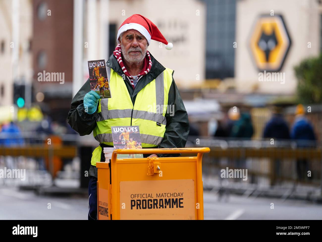 Programme Seller Programme seller before for the Premier League match at Molineux ...