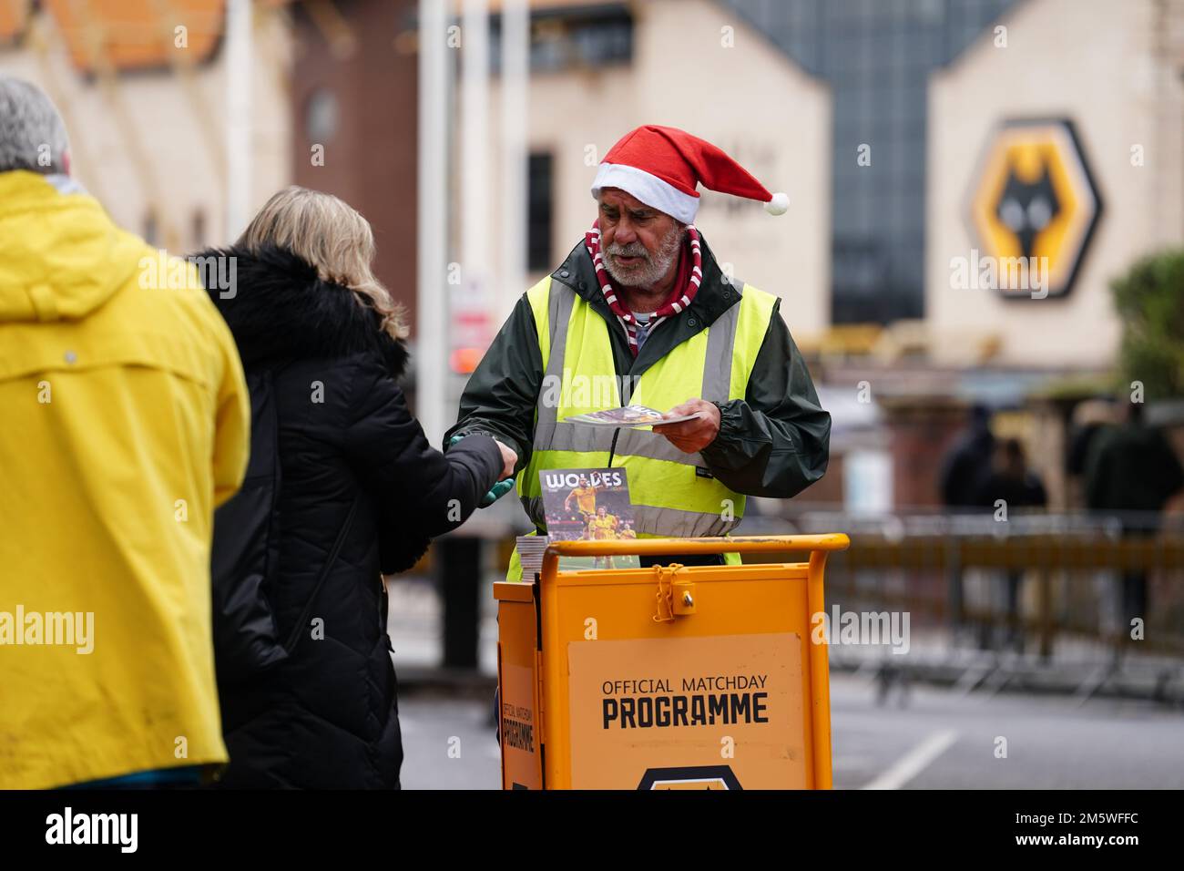 Programme Seller Programme seller before for the Premier League match at Molineux ...
