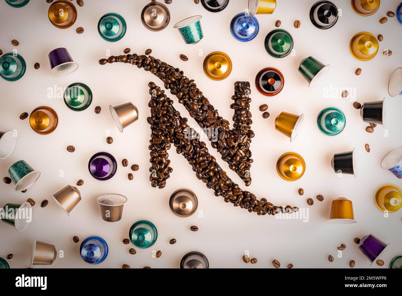 Food photography, Nespresso logo made from coffee beans with Nespresso capsules Stock Photo