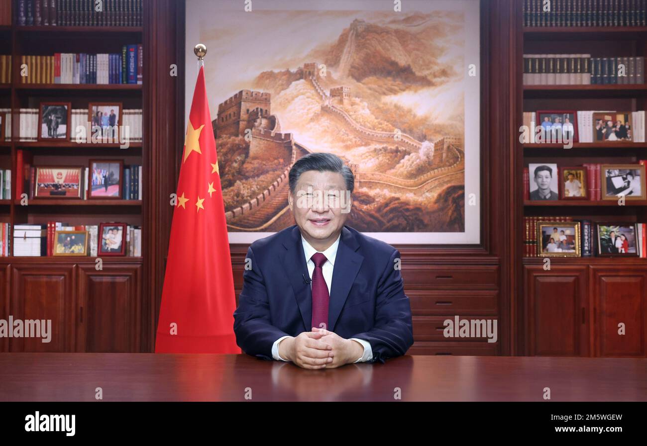 Beijing, China. 31st Dec, 2022. Chinese President Xi Jinping delivers a New Year address Saturday evening in Beijing to ring in 2023. Credit: Ju Peng/Xinhua/Alamy Live News Stock Photo
