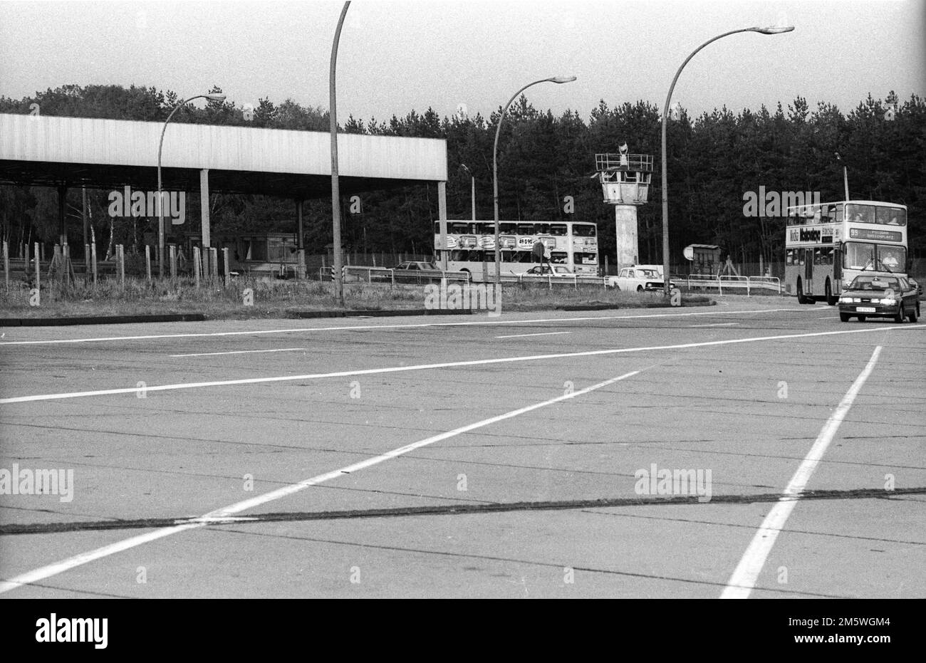 GDR, Berlin, 24. 08. 1990, check-in building of the former Dreilinden border crossing, watchtower, bus, C Rolf Zoellner Stock Photo