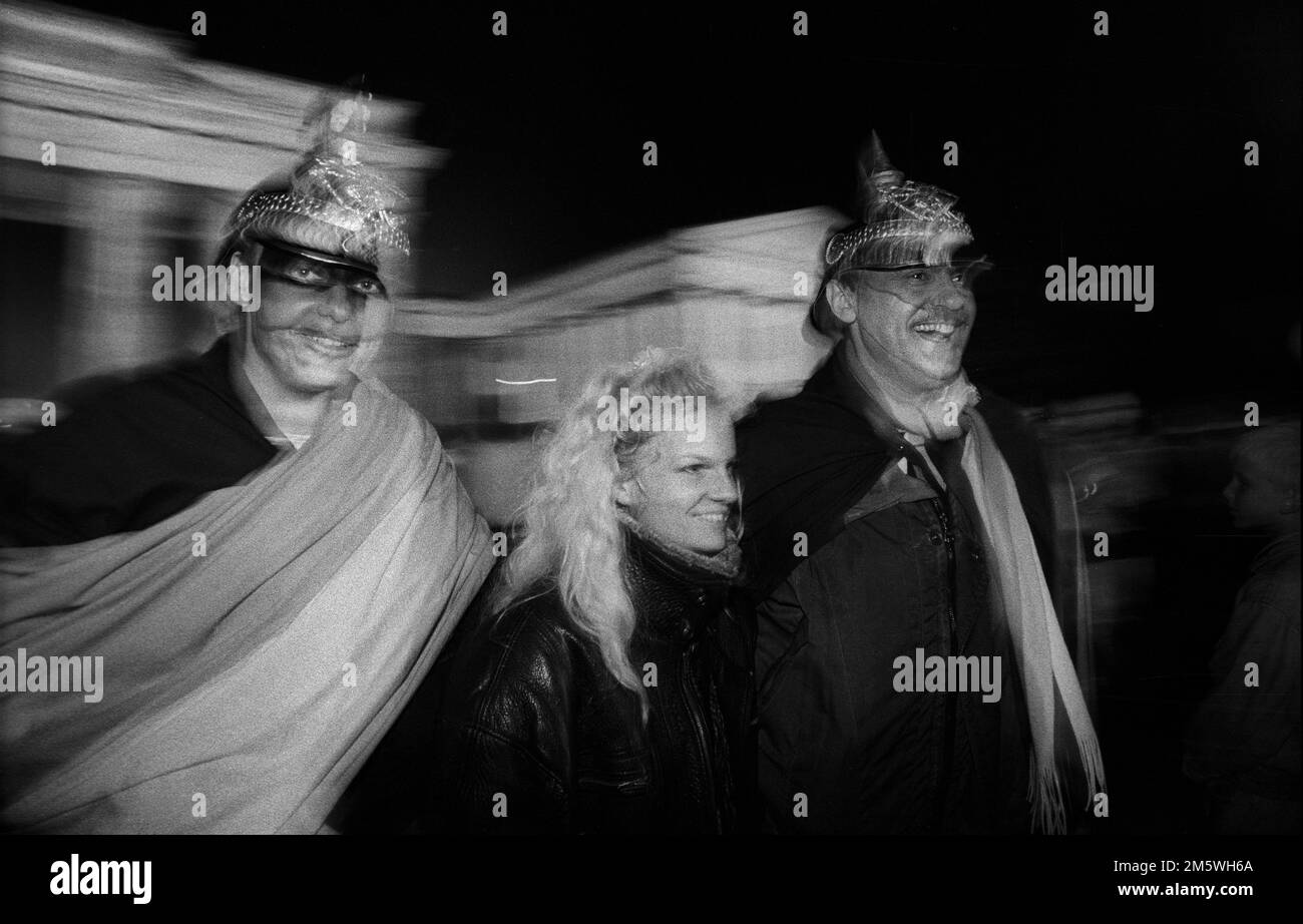 GDR, Berlin, 02. 10. 1990, celebration of reunification on the evening of 2 October at the Brandenburg Gate, pointed cap, spiked cap Stock Photo