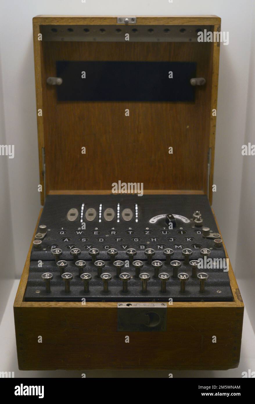 German Enigma brand encryption machine, with a commercial model K-type box. 1931. Metal, wood and leather. Army Museum. Toledo, Spain. Stock Photo