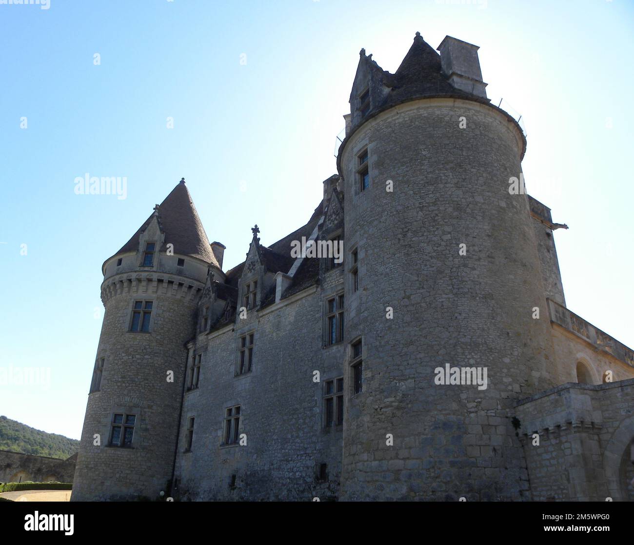 A low angle shot of the Chateau des Milandes during daytime in Castelnaud-la-Chapelle, France Stock Photo