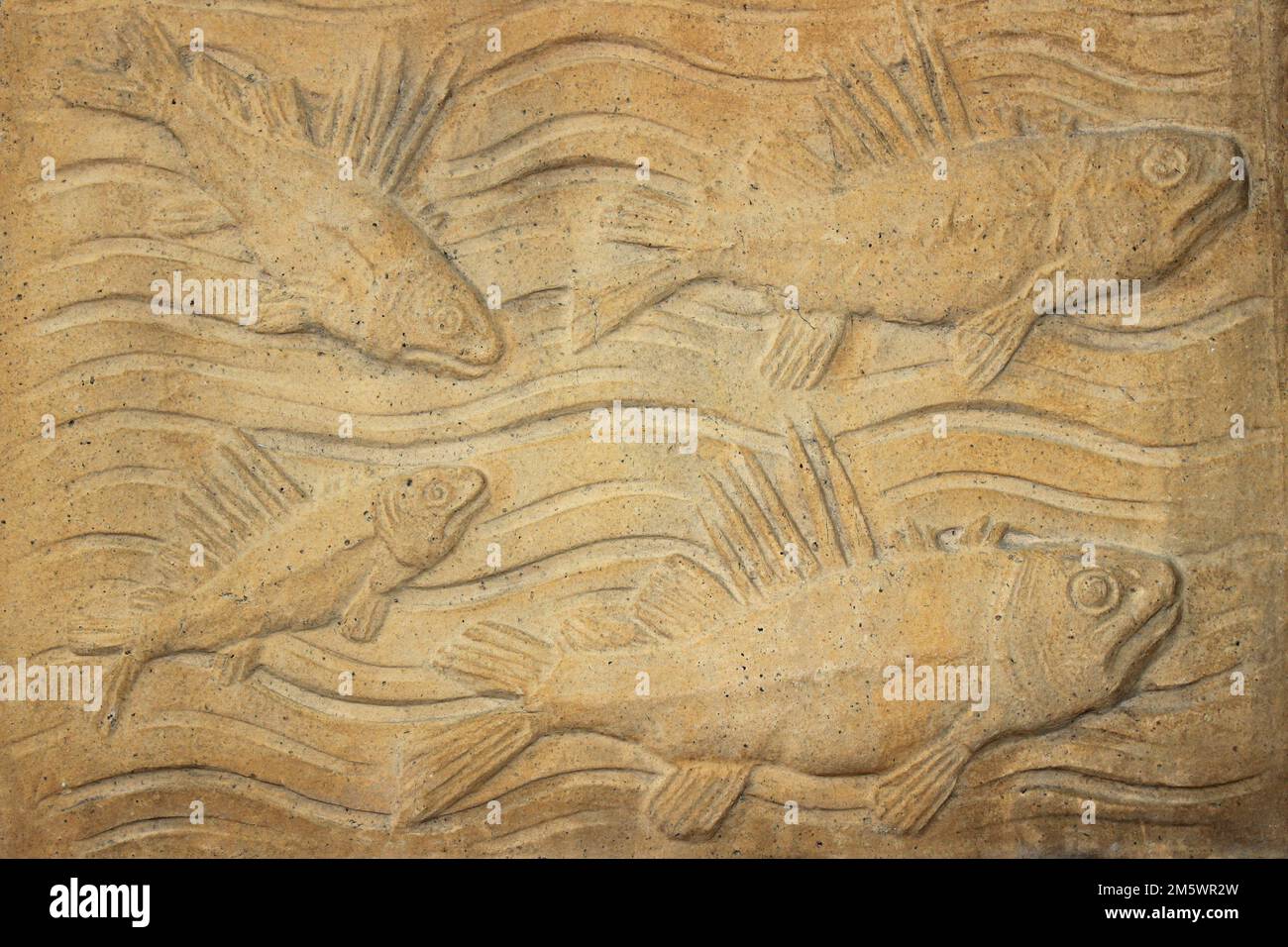 Stone Carving Fossilised Fishes - Natural History Museum London Stock Photo