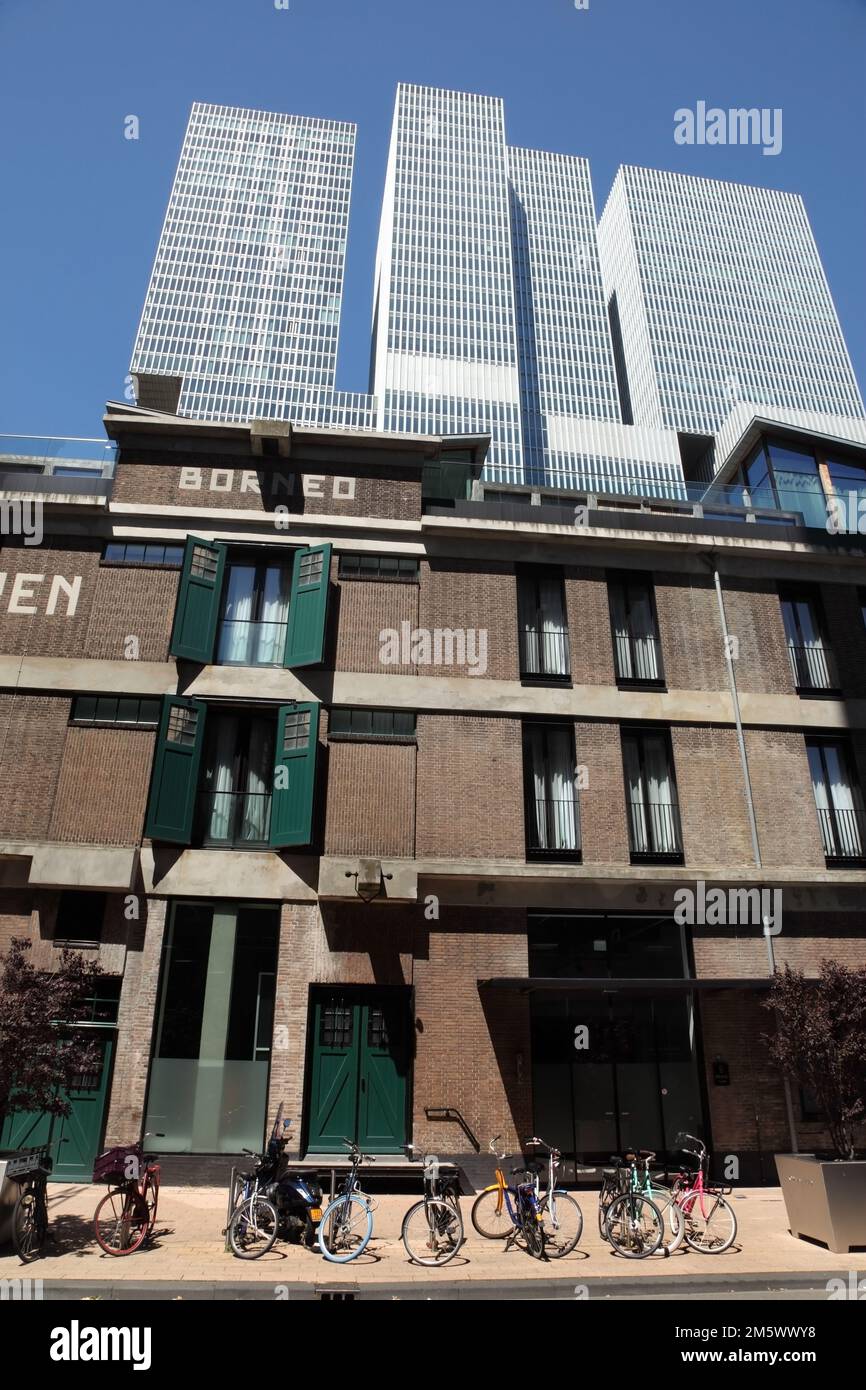 De Rotterdam "vertical city" behind old brick warehouse converted into