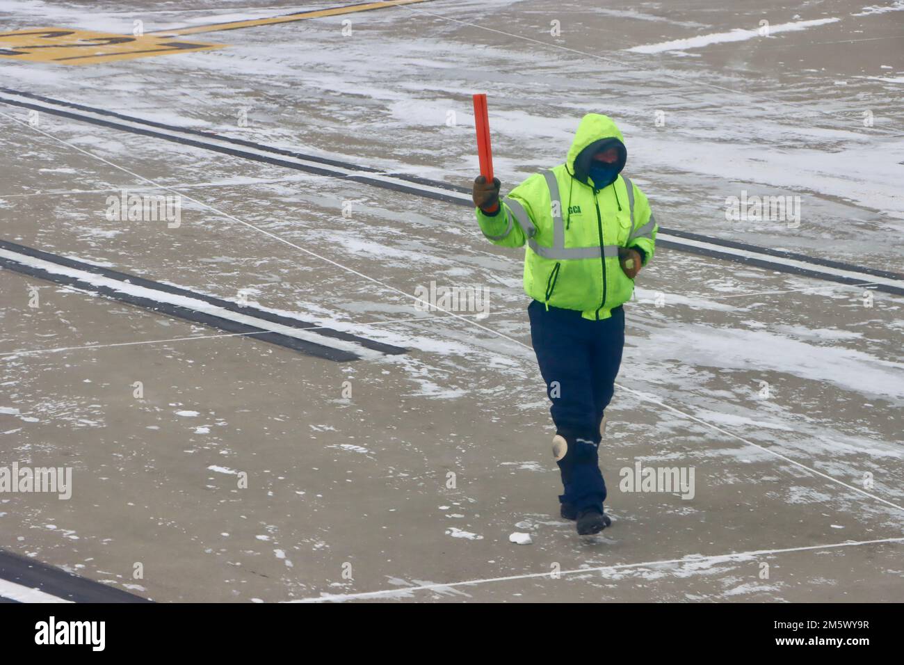 Lonely airport tarmac worker hires stock photography and images Alamy