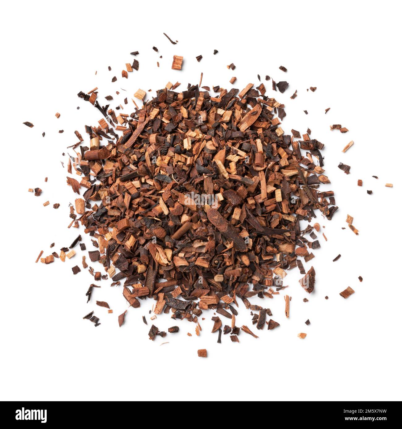 Heap of dried rooibos, bush tea, red tea, redbush tea leaves from South Africa close up on white background Stock Photo