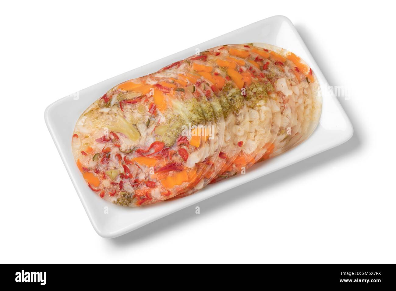 Dish with colorful delicious slices of vegetables in aspic close up