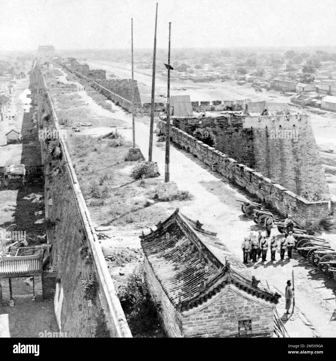 Boxer Rebellion.The Wall of Peking, guarded by the Russian artillery. Photo by B.W. Kilburn Company, c. 1900 Stock Photo