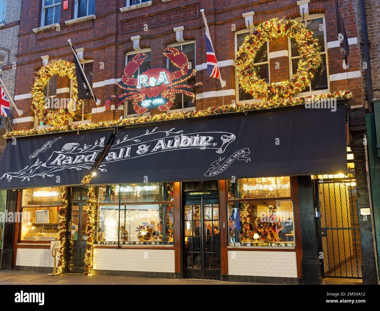 A colourful front view of the Randall & Aubin seafood restaurant in