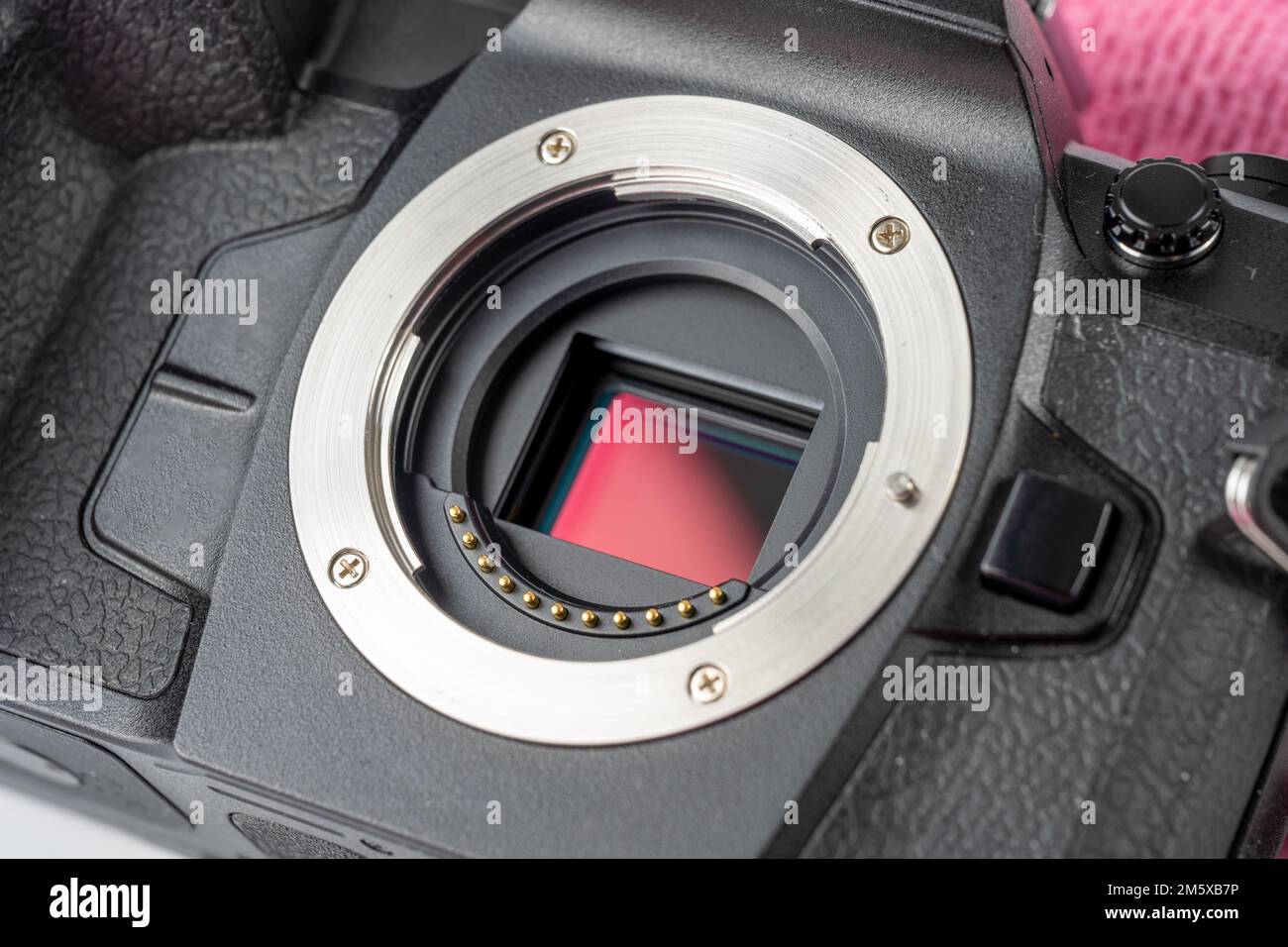 close up of a camera CMOS imaging sensor, electrical contacts  and bayonet mount Stock Photo