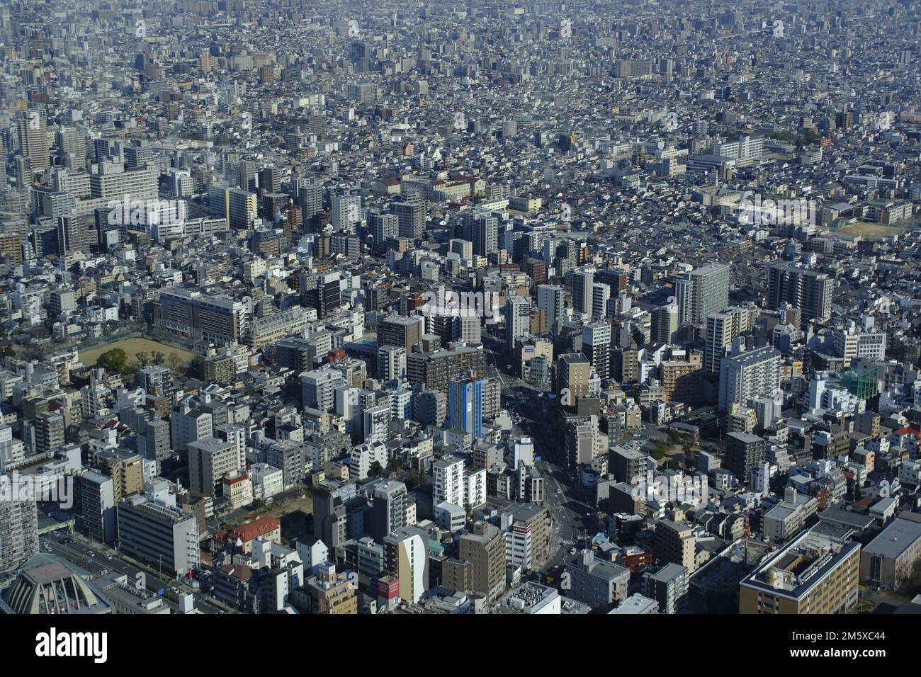 Visitors look at a panoramic view of the city from Abeno Harukas deck