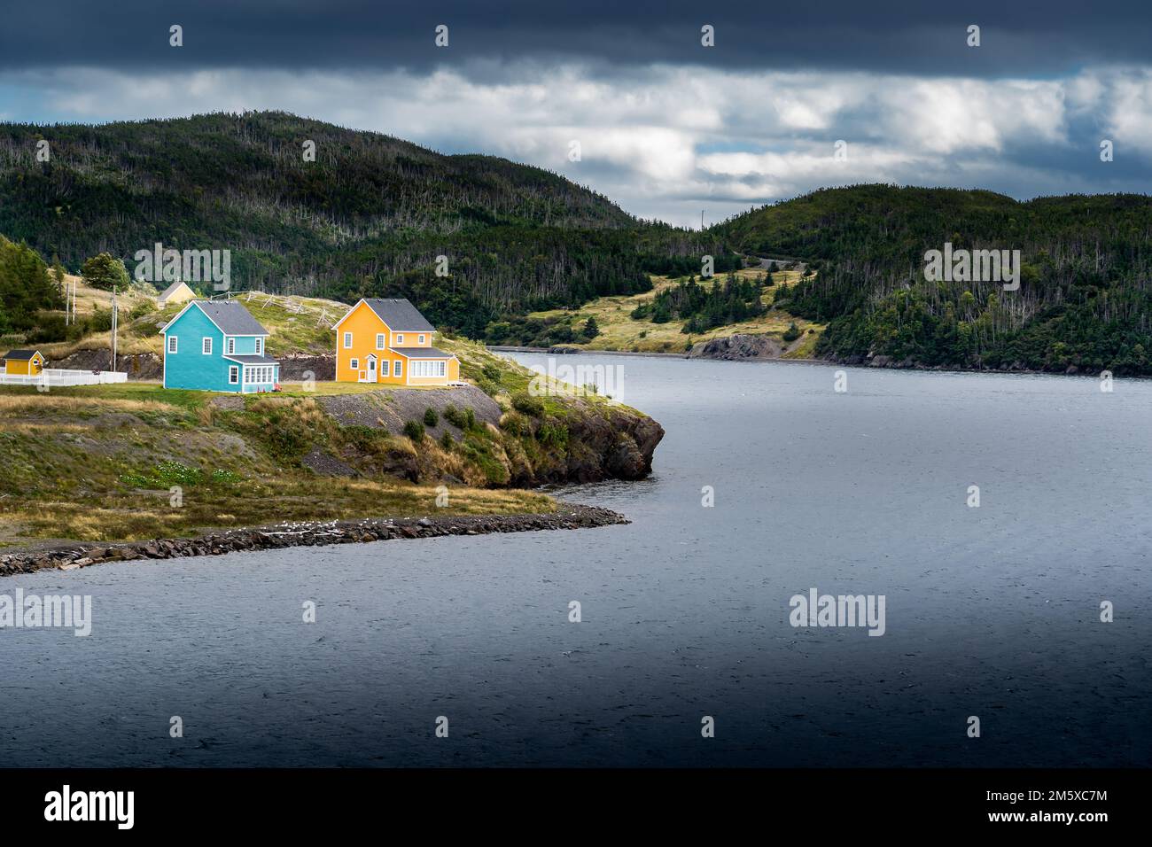Colourful rustic homes sit on an East Coast peninsula near the town of