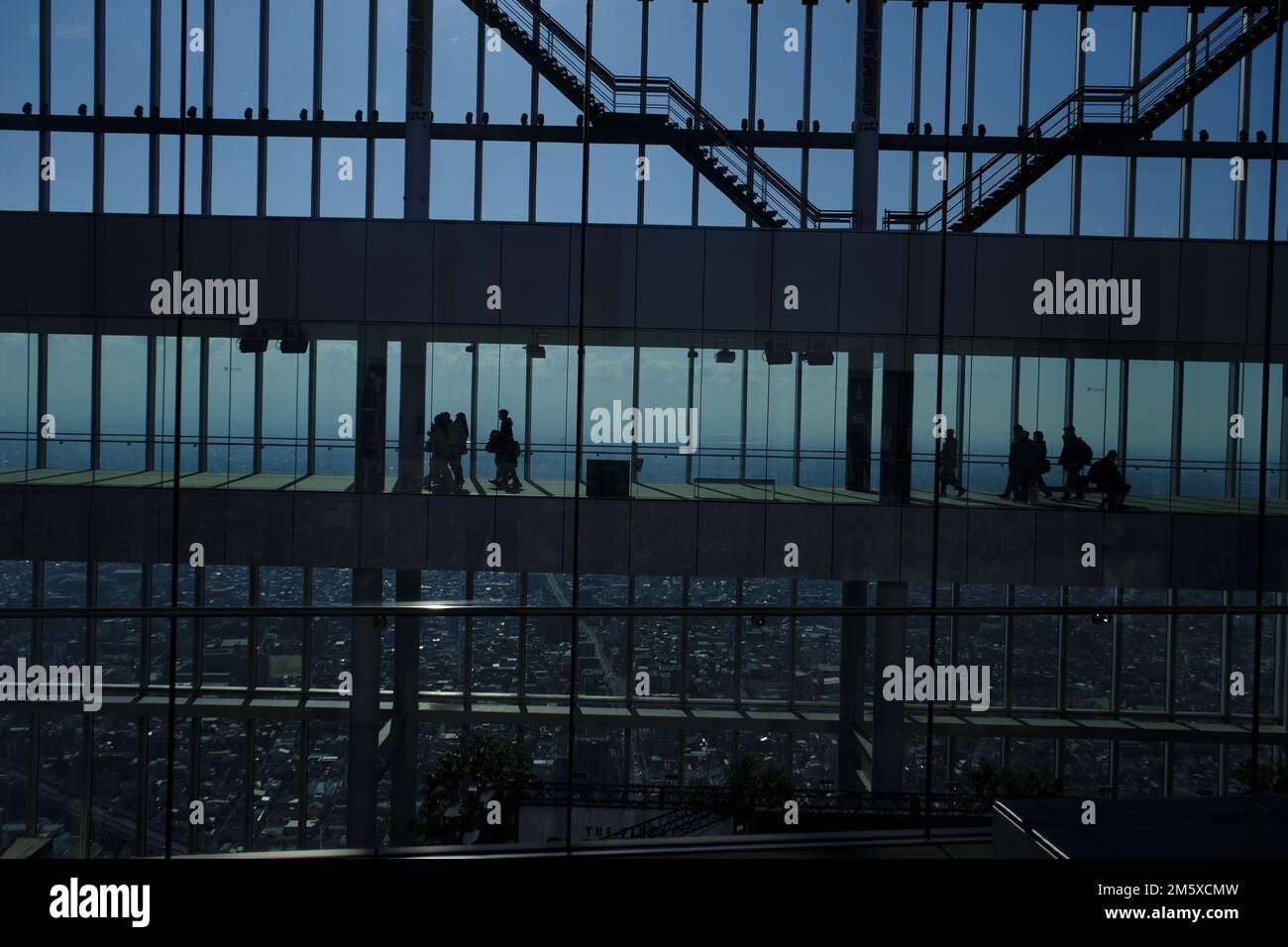 Osaka, Japan. 31st Dec, 2022. Visitors look at a panoramic view of the