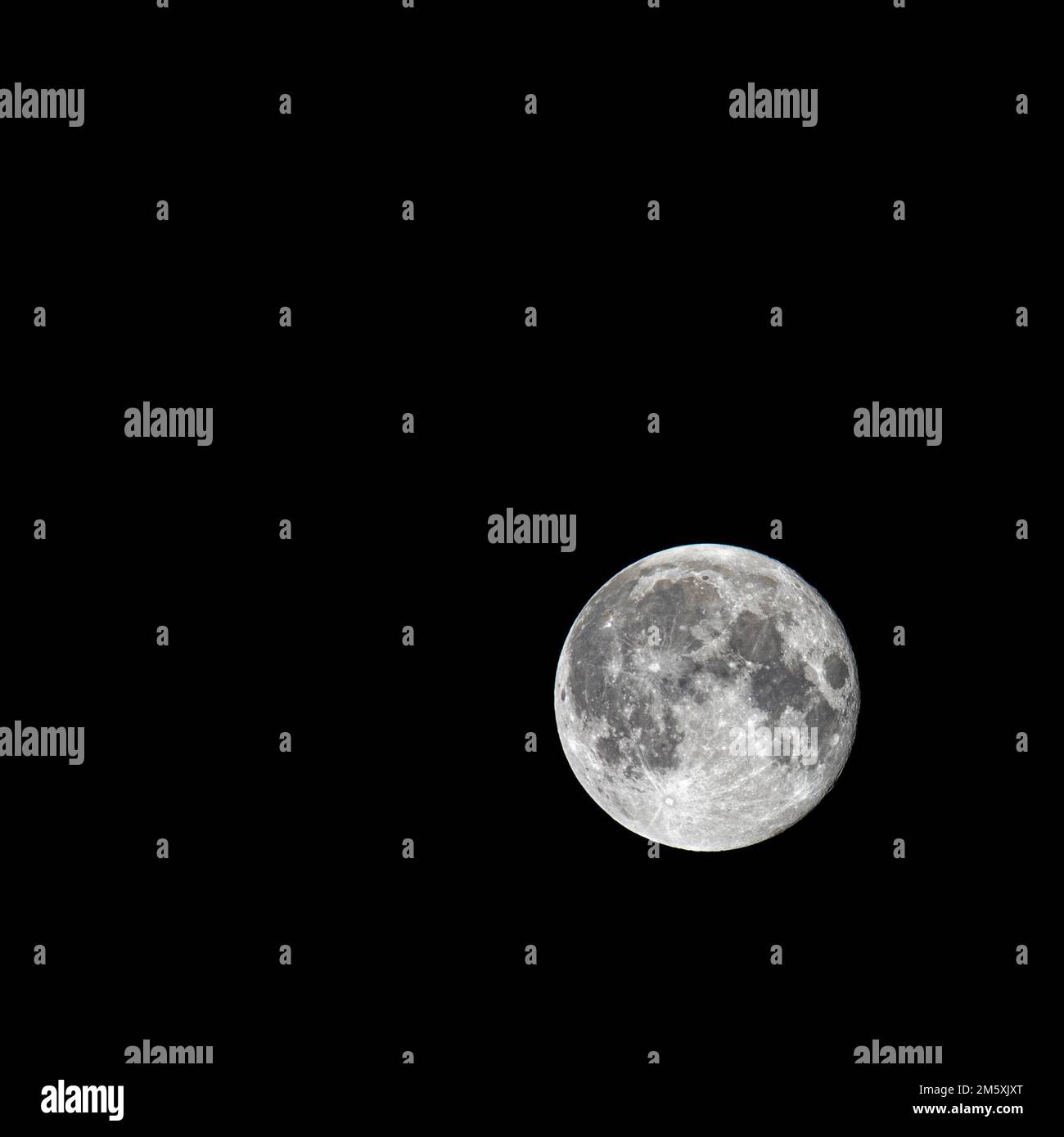 The pale full moon isolated on black background, close-up Stock Photo ...