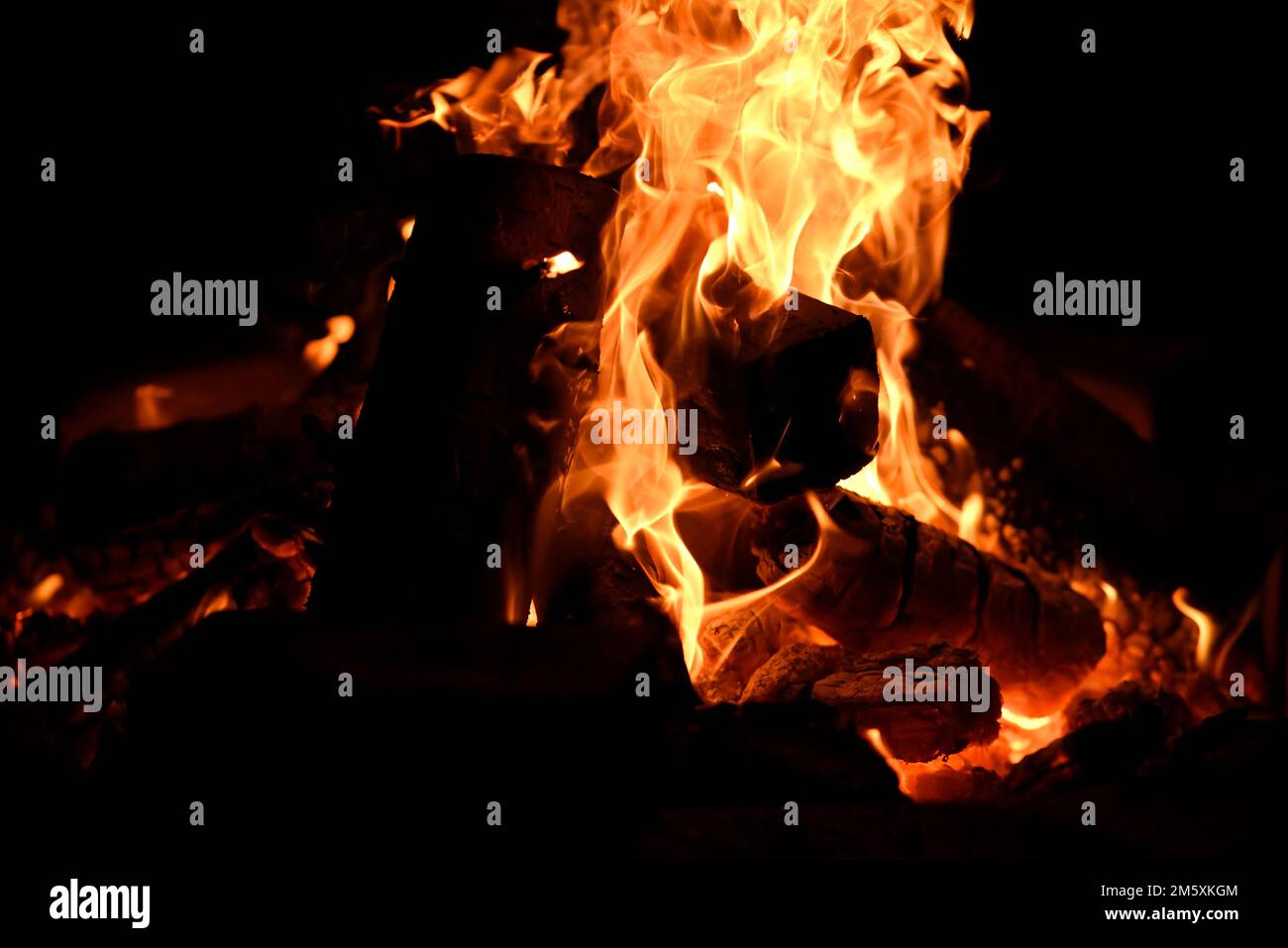 The wood burning in bonfire Stock Photo - Alamy