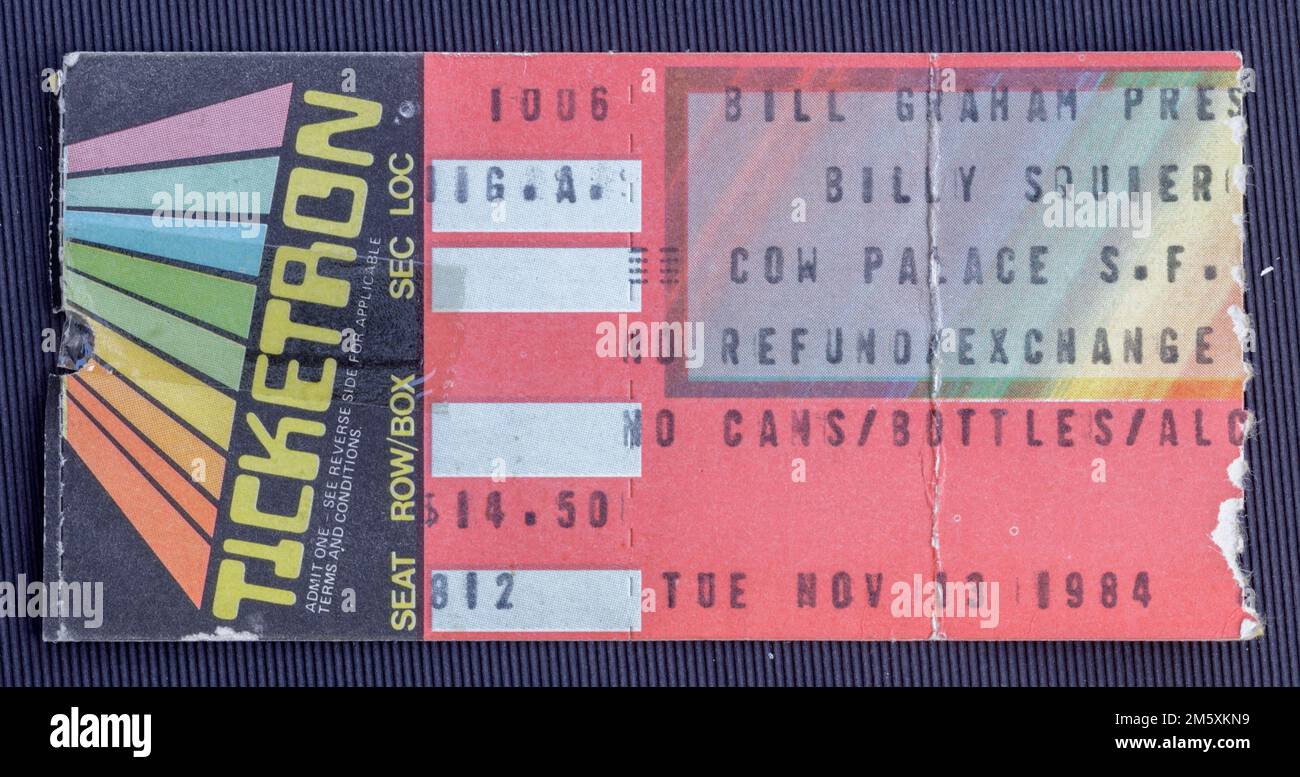 San Francisco, California - November 13, 1984 - Old used ticket for the concert of Billy Squier at the Cow Palace Stock Photo