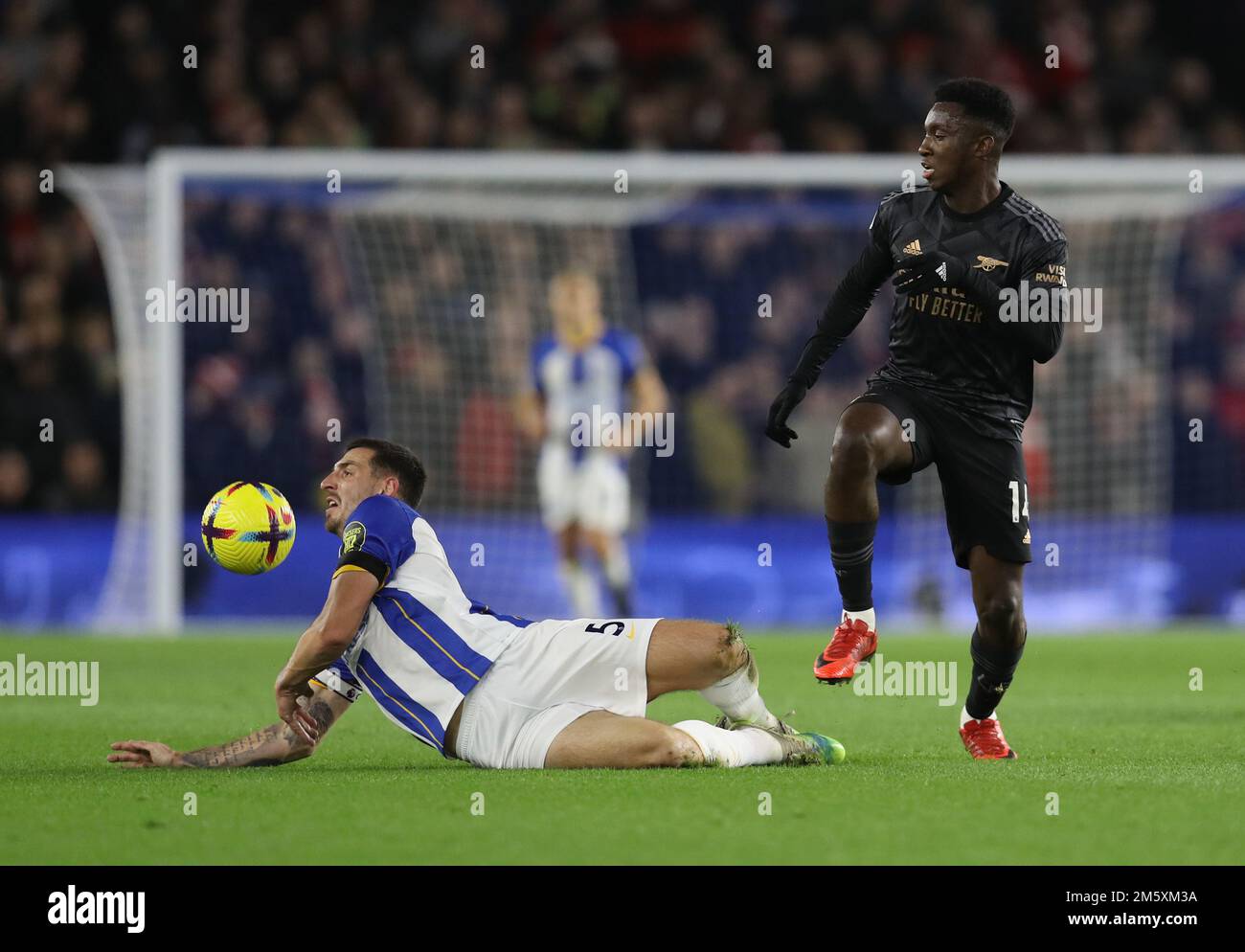 Brighton and Hove, UK. 31st Dec, 2022. Lewis Dunk of Brighton tackles Eddie Nketiah of Arsenal during the Premier League match at the AMEX Stadium, Brighton and Hove. Picture credit should read: Paul Terry/Sportimage Credit: Sportimage/Alamy Live News Stock Photo